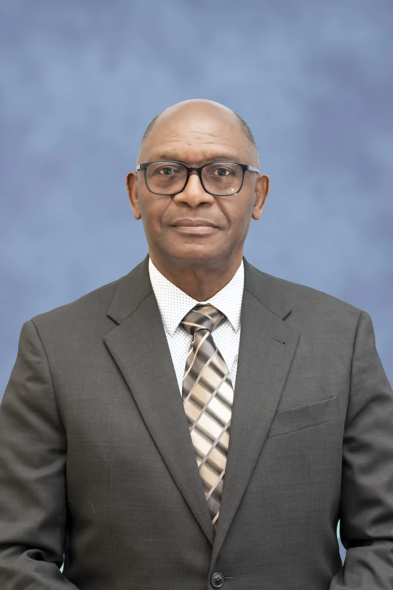 Major Ricky Stennett Derrick A. Stennett - FIRM Insurance Brokers Ltd.